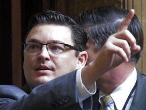 FILE - In this Feb. 8, 2017, photo, Rep. Jon Stanard, R-St. George, votes on the House floor, at the Utah State Capitol, in Salt Lake City. The Utah House of Representatives is investigating whether a lawmaker who abruptly resigned used a state-issued cellphone and hotel room paid for with taxpayer money to arrange trysts with a prostitute. House Speaker Greg Hughes declined to comment on a Thursday, Feb. 8, 2018, report in British newspaper the Daily Mail that former Republican Rep. Stanard twice hired a prostitute in 2017.
