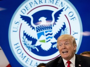 President Donald Trump speaks during a roundtable at the Customs and Border Protection National Targeting Center in Reston, Va., Friday, Feb. 2, 2018.