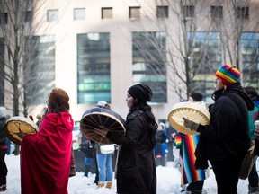 Women sing and drum during a rally for Tina Fontaine in Vancouver, B.C., on Saturday February 24, 2018. A man accused of killing a 15-year-old Indigenous girl and dumping her body in Winnipeg's Red River was found not guilty of second-degree murder this week.Tina Fontaine's remains were discovered eight days after she was reported missing in August 2014.