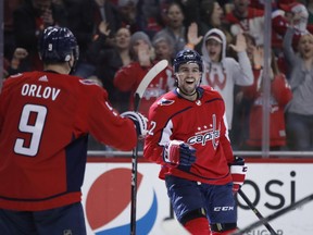 Washington Capitals defenseman Matt Niskanen, right, celebrates his goal with defenseman Dmitry Orlov (9), from Russia, in the second period of an NHL hockey game against the Vegas Golden Knights, Sunday, Feb. 4, 2018, in Washington.