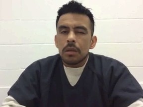 In this undated still image taken from video, Jesus Chavez Flores is shown during an interview at the Northwest Detention Center in Tacoma, Wash. A new federal lawsuit claims that Flores was beaten and placed in solitary confinement because of his role in a hunger strike at the center. The Washington state chapter of the American Civil Liberties Union on Friday, Feb. 23, 2018, sued U.S. Immigration and Customs Enforcement as well as GEO Group, which operates the center. (Northwest Detention Center Resistance/via AP)
