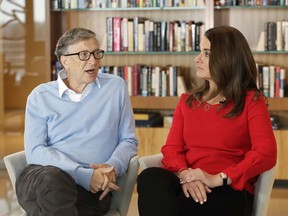 In this Feb. 1, 2018 photo, Microsoft co-founder Bill Gates and his wife Melinda take part in an interview with The Associated Press in Kirkland, Wash. Gates and his wife, head the Bill and Melinda Gates Foundation, are rethinking their work in America as they confront what they consider an unsatisfactory track record, the country's growing inequity and a president they disagree with more than any other.