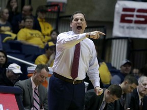 Iowa State head coach Steve Prohm screams directions to his players during the first half of an NCAA college basketball game against West Virginia Saturday, Feb. 24, 2018, in Morgantown, W.Va.