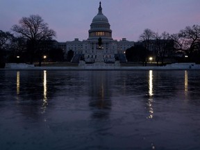 The Capitol Dome of the Capitol Building at sunrise, Friday, Feb. 9, 2018, in Washington. The Senate is ready for a showdown debate over immigration, including whether to protect young "Dreamers" from deportation, in an election-year battle that's sure to electrify both parties' most fervent voters and could well end in stalemate.