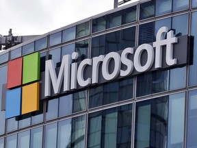 FILE - This April 12, 2016, file photo shows the Microsoft logo in Issy-les-Moulineaux, outside Paris, France. Microsoft has an eye on its international customers as it confronts the Trump administration in a Supreme Court fight about turning over emails to investigators. The justices will hear arguments Feb. 26, 2018, over whether the company, as part of an international drug trafficking investigation, must comply with an American warrant for emails stored on a server in a Microsoft facility in Dublin, Ireland.