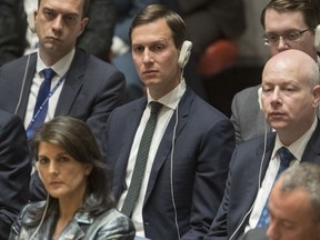 In this Feb. 20, 2018 photo, White House senior adviser Jared Kushner, center, listens as Palestinian President Mahmoud Abbas speaks during a Security Council meeting on the situation in Palestine at United Nations headquarters.  Kushner has lost his access to the nation's deepest secrets, which could be problematic in his role overseeing the Trump administration's efforts to produce Mideast peace.