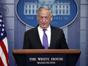 In this Feb. 7, 2018, photo, Defense Secretary Jim Mattis speaks during the daily news briefing at the White House, in Washington. Mattis says he confirmed that the nearly 850 immigrants currently serving in the military or waiting to start training won't face deportation despite the ongoing federal wrangling over the fate of people who came to America illegally as children.