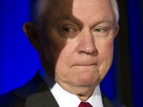 In this Feb. 12, 2018, photo, Attorney General Jeff Sessions waits onstage to address the National Sheriffs' Association Winter Conference on law enforcement efforts to combat the opioid crisis and violent crime, in Washington. The sudden departure of the Justice Department's No. 3 official is adding to the turmoil at an agency that already lacks permanent, politically appointed leaders over many of its most important divisions. Sessions lamented the problem during a Monday speech, laying blame on a single Republican senator who is upset with his new, tougher marijuana policy.
