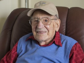 In this Nov. 11, 2015, photo, Max Desfor at his home in Silver Spring, Md. Desfor, a former Associated Press photographer who won a Pulitzer Prize for his coverage of the Korean War died Monday, Feb. 19, 2018. He was 104.