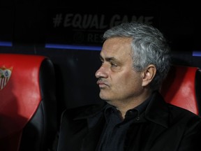 Manchester United manager Jose Mourinho sits on the bench before the Champions League round of sixteen first leg soccer match between Sevilla FC and Manchester United at the Ramon Sanchez Pizjuan stadium in Seville, Spain, Wednesday, Feb. 21, 2018.