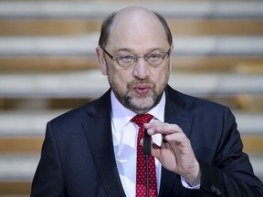 Martin Schulz, head of Germany's Social Democratic Party, SPD, speaks to journalists at the start of a new round of coalition talks in Berlin, Sunday, Feb. 4, 2018.  Chancellor Angela Merkel's conservatives and the center-left Social Democrats embarked Sunday on what they hope is their last round of talks on forming a new German government, although the negotiations could take up to two more days.