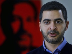 In this Monday, Feb. 12, 2018 photo, Ayman Mhanna, executive director of the Samir Kassir Foundation, a press freedoms organization named after the late editor of Lebanon's An-Nahar newspaper, who was assassinated in 2005, speaks during an interview with The Associated Press, in Beirut, Lebanon. A string of criminal suits against Lebanese journalists, researchers and even late night comedy hosts has jolted the small country, long seen as an island of free speech in a region dominated by autocrats. Lebanese authorities are cracking down on criticism of the military, politicians and foreign leaders ahead of national elections.