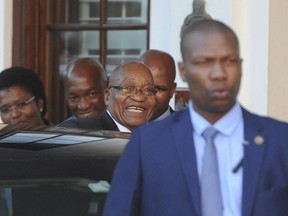 South African President Jacob Zuma leaves parliament in Cape Town, South Africa, Wednesday, Feb 7, 2018. Zuma's exit from power because of scandals appears to be getting closer with his deputy, Cyril Ramaphosa, who is expected to replace him, saying he anticipates a "speedy resolution" to transition talks he is holding with Zuma.