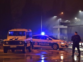 Police block off the area around the U.S. Embassy in Montenegro's capital Podgorica, Thursday, Feb. 22, 2018. Local media say that an unknown assailant hurled a hand grenade toward the embassy at around midnight local time (1100 GMT) and then killed himself with another explosive device.