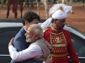 Indian Prime Minister Narendra Modi hugs his Canadian counterpart Justin Trudeau as Trudeau arrived at the Indian presidential palace for ceremonial reception, in New Delhi, India, Friday, Feb. 23, 2018. Trudeau is in India on a weeklong visit aimed at enhancing business ties between the two countries. Trudeau and Indian Prime Minister Narendra Modi are also expected to focus on areas including civil nuclear cooperation, space, defense, energy and education.