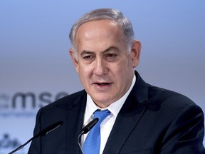 Israel's Prime Minister Benjamin Netanyahu,  delivers a speech during the International Security Conference in Munich, Germany, Sunday, Feb. 18, 2018.