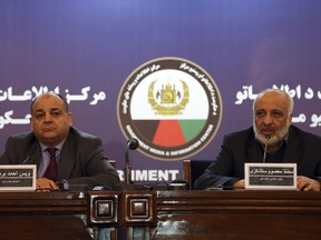 Masoom Stanekzai Afghanistan's intelligence chief, right, and Wais Ahmad Barmak, interior minister speaks during a joint press conference in Kabul, Afghanistan, Thursday, Feb. 1, 2018. At the news conference Wais Ahmed Barmak said they has given neighboring Pakistan confessions and other proof that the militants who carried out a recent series of attacks were trained in Pakistan and that Taliban leaders there are allowed to roam freely.