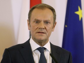 European Council President Donald Tusk speaks at a joint news conference with Austrian Chancellor Sebastian Kurz after their meeting at the federal chancellery in Vienna, Austria, Tuesday, Feb. 13, 2018.