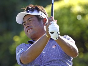 Yuta Ikeda of Japan tees off on the 1st hole during the third round of the Maybank Championship golf tournament in Shah Alam, Malaysia, Saturday, Feb. 3, 2018.