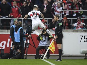 Daniel Ginczek celebrates his opening goal during the German Bundesliga soccer match between VfB Stuttgart and Borussia Moenchengladbach, in Stuttgart, Germany, Sunday, Feb. 11, 2018.