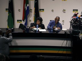 Secretary General of the African National Congress, (ANC) Ace Magashule, right, and his deputy, Jesse Duarte, left, at a briefing at the ANC headquarters in downtown Johannesburg, Tuesday, Feb. 13, 2018. Magashule said the scandal-tainted President Jacob Zuma must leave office.