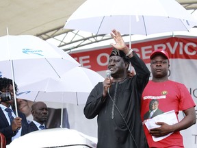 Kenyan Opposition leader Ralia Odinga addresses thousands of people who gathered to pay their last respects to Morgan Tsvangirai in Buhera, Zimbabwe about 200 kilometres south east of Harare, Tuesday, Feb, 20, 2018. Zimbabwe's veteran opposition leader Morgan Tsvangirai, aged 65, died Feb 14 and was laid to rest at his rural home of Buhera.