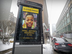 Electronic billboard on Mountain St in Montreal displays amber alert for missing ten year old Ariel Jeffrey Kouakou Tuesday March 13, 2018.  The young boy went missing on Monday.