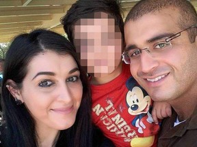 Omar Mateen, right, with his wife, Noor Zahi Salman, and their son.