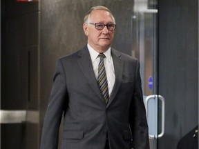 Former Montreal mayor Gerald Tremblay leaves courtroom for a break before testifying at the Contrecoeur fraud trial of former executive committee chairman Frank Zampino, former construction magnate Paolo Catania and others at the Palais de Justice in Montreal on Monday, May 1, 2017.