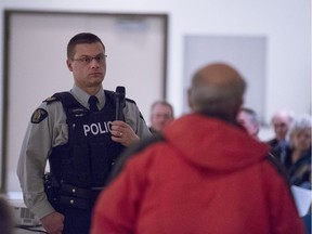 Sgt. Colin Sawrenko speaks during a RCMP hosted town hall in Biggar on Monday, March 5, 2018.