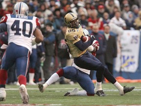 In this 2007 file photo, Winnipeg Blue Bombers receiver Milt Stegall makes a catch against the Montreal Alouettes.