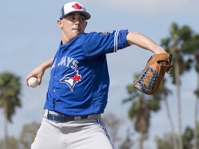 Toronto Blue Jays pitcher Aaron Sanchez throws live batting practice at spring training in Dunedin, Fla. on Tuesday, February 20, 2018. (THE CANADIAN PRESS/Frank Gunn)
