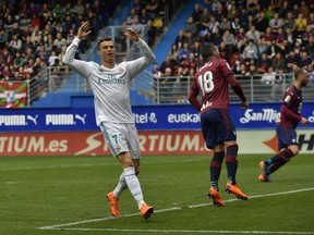 Real Madrid's Cristiano Ronaldo, gestures after missing a goal during the Spanish La Liga soccer match between Real Madrid and SD Eibar at Ipurua stadium, in Eibar, northern Spain, Saturday, March10, 2018. Real Madrid won the march 2-1.