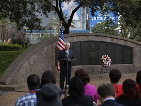 U.S. Secretary of State Rex Tillerson speaks to survivors, seated in foreground, after laying a wreath during a ceremony at Memorial Park in honor of the victims of the deadly 1998 U.S. Embassy bombing, in Nairobi, Kenya, Sunday, March 11, 2018.  In 1998 the US embassies were bombed in near simultaneous attacks in two East African cities, in which over 200 people were killed.