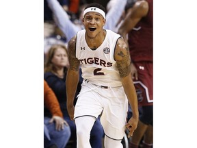 Auburn guard Bryce Brown celebrates after scoring a three-point basket during the first half of an NCAA college basketball game against South Carolina, Saturday, March 3, 2018, in Auburn, Ala.