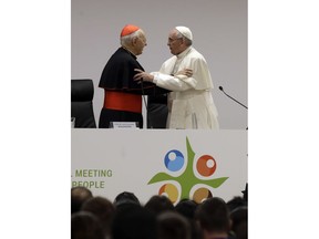 Pope Francis is greeted by cardinal Lorenzo Baldisseriat as he arrives at the opening session of the pre-synod of the youths meeting, at the Mater Ecclesiae college in Rome , Monday, March 19, 2018.