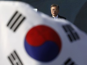 FILE - In this March 1, 2018 file photo, South Korean President Moon Jae-in delivers a speech during a ceremony celebrating the 99th anniversary of the March First Independence Movement against Japanese colonial rule, at Seodaemun Prison History Hall in Seoul, South Korea. Jae-in's visit to the United Arab Emirates this week shows the Asian nation's deepening cooperation with the Gulf country, from buying its oil, building the Arabian Peninsula's first nuclear power plant and potentially backing it in war.