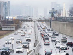 Vehicles makes there way into and out of downtown Toronto along the Gardiner Expressway in Toronto on Thursday, November 24, 2016.