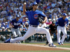 Chicago Cubs pitcher Yu Darvish throws during the first inning of a spring training baseball game against the Los Angeles Dodgers, Tuesday, March 6, 2018, in Mesa, Ariz.