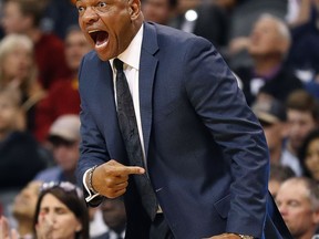 Los Angeles Clippers head coach Doc Rivers yells to his team during the first half of an NBA basketball game against the Phoenix Suns Wednesday, March 28, 2018, in Phoenix.