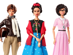 Barbie dolls of pilot Amelia Earhart, left, Mexican artist Frida Kahlo and mathematician Katherine Johnson.