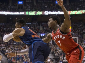 Oklahoma City Thunder's Russell Westbrook (left) steals the ball off Toronto Raptors' Kyle Lowry during first half NBA basketball action in Toronto on Sunday, March 18, 2018.