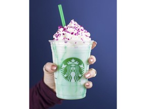 In this undated photo released by Edelman, U.S. Starbucks Coffee Company displays a new Crystal Ball Frappuccino Purple beverage.