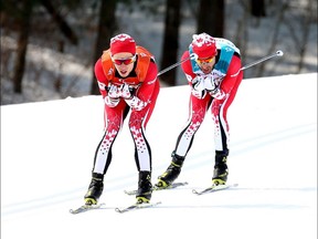 Graham Nishikawa, left, guides Brian McKeever around the cross-country ski track during the Winter Paralympics visually impaired 20-kilometre free race on Monday, March 12, 2018 in Pyeongchang. McKeever took the gold medal, his 11th all-time and 14th total medal to become Canada's decorated winter Paralympian of all-time.