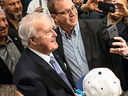 Former Prime Minister Brian Mulroney is surrounded by supporters at a fundraiser for his daughter Caroline's Ontario PC Party leadership campaign in Kleinburg, Ont.,  Tuesday, March 6, 2018.