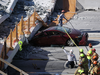 Rescue workers at the scene of a collapsed pedestrian bridge in Miami, Florida, on March 15, 2018.