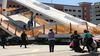 Emergency personnel respond to people near a collapsed pedestrian bridge at Florida International University on Thursday, March 15, 2018, in the Miami area.