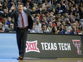 Texas Tech head coach Chris Beard gestures from the sideline during the first half of an NCAA men's college basketball tournament regional final against Villanova, Sunday, March 25, 2018, in Boston.