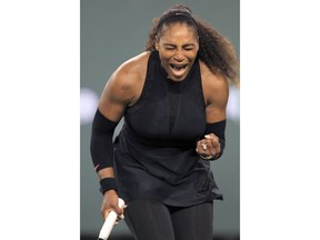 Serena Williams reacts while playing Zarina Diyas during the first round of the BNP Paribas Open tennis tournament in Indian Wells, Calif., Thursday, March 8, 2018.