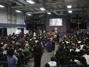 Mourners listen to speakers during the funeral services for Stephon Clark at Bayside Of South Sacramento Church in Sacramento, Calif., Thursday, March 29, 2018. Clark, who was unarmed, was shot and killed by Sacramento Police Officers, Sunday, March 18.